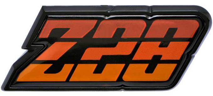 OER 1980-81 Camaro "Z28" Orange Fuel Door Emblem 9637809